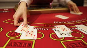 Teen Patti dengan kombinasi angka kartu di meja judibola